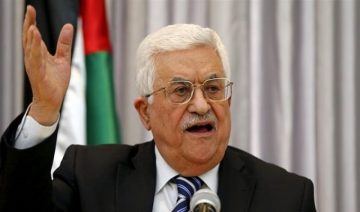 عباس يُعلن عن دستور مؤقت وينظم انتخابات بعد انتهاء عام من الحرب